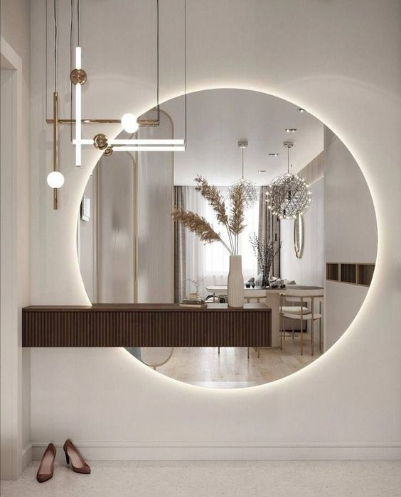 huge mirror showing reflection of living room