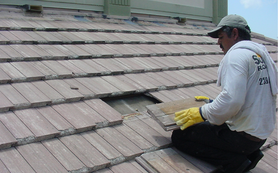 a man installing roof